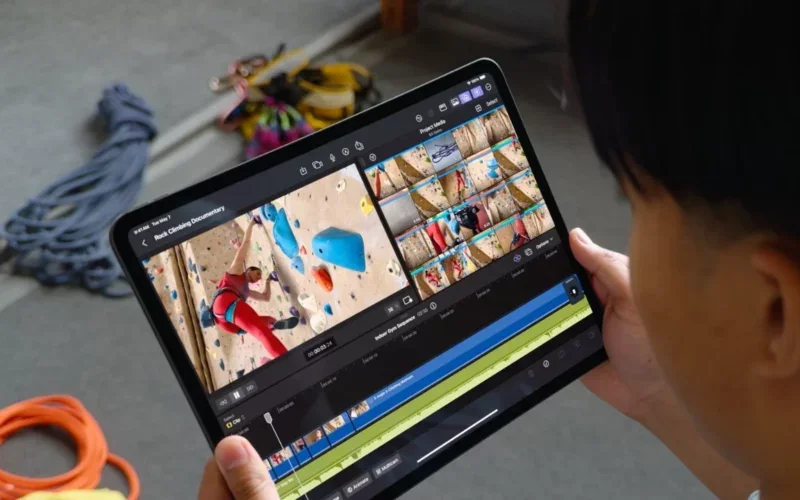 一名用户手持 iPad,用 Final Cut Pro 剪辑攀岩纪录片素材
