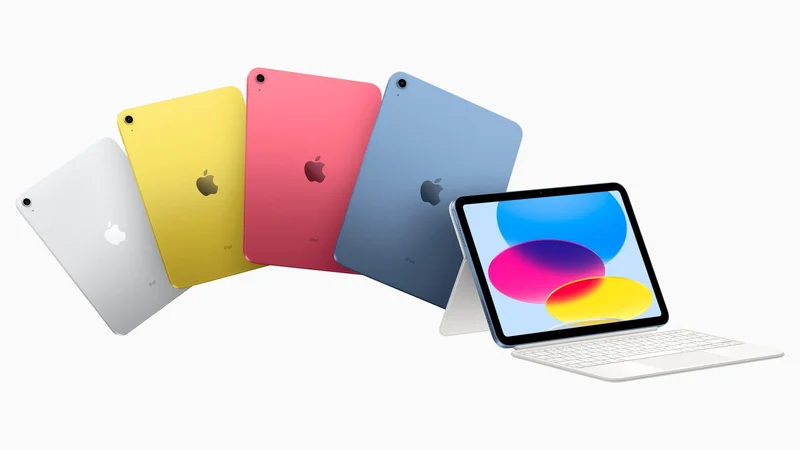 现款入门款 iPad 多色官方渲染图,银色、黄色、粉色与蓝色四款配色,右侧一台搭配键盘保护盖