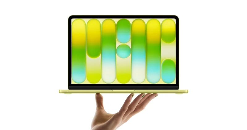 苹果官网产品图:柑橘黄色的 MacBook Neo 以四分之三视角悬浮,屏幕上是一组绿、黄、蓝渐变的竖条与圆形图案,屏幕下方可见键盘前沿与接口